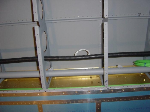 Aileron tabs riveted to 'neutral position' pushrod'