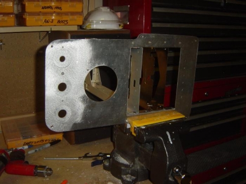 Center radio stack mounting trays in process