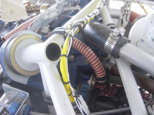 shows the magneto bracket attachment and adel clamp holding blast tube in proper orientation.