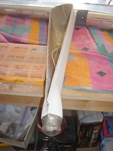 Whelen strobe/light attached w/ nuts floxed to inside of fairing