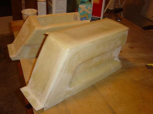 Added 8 ply lay-up to the top of armrest console.