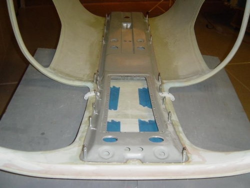 Console floxed and clecoed to cabin top for curing overnight