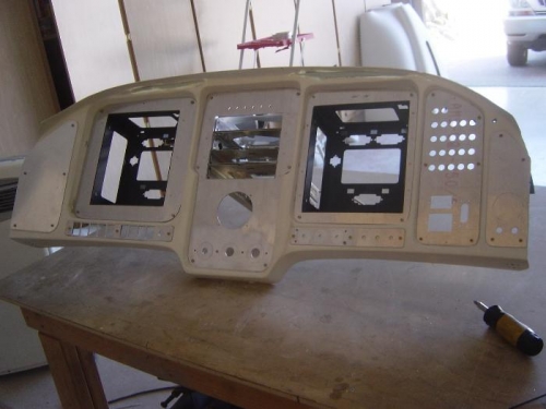 Centerstack trays mounted in sub-panel