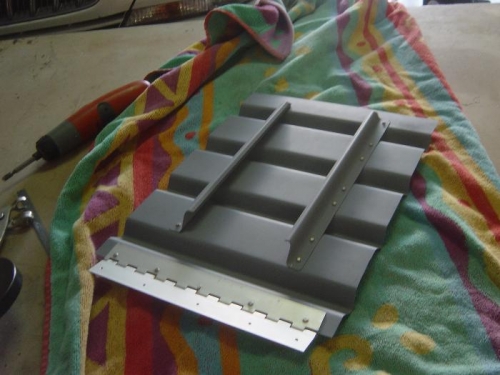 Door with J channel stiffeners