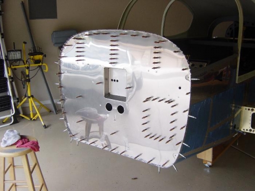 Faux firewal glued and clecoed to orig fw