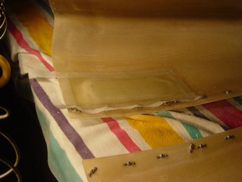 Repaired lowere cowl where oil had penetrated the finerglass and become 'lodged' within th eParalam