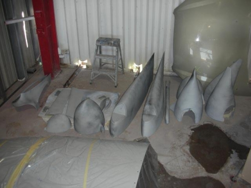 Some of the fiberglass parts after priming and sanding