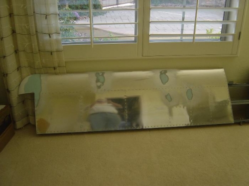 Nose rib rivet line depressions filled