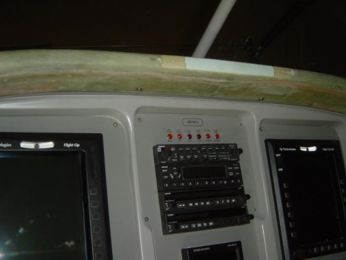 Glareshield mounted to upper forward fuse skin using # 6 'clip-nuts'