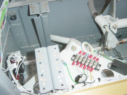 Re routed wiring and installed mid seat rail support