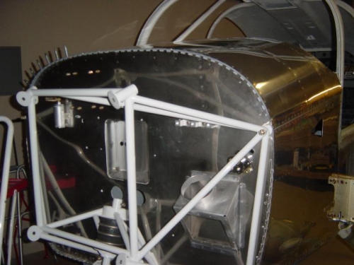 upper fwd fuse riveed in place and cowl attach hinges riveted