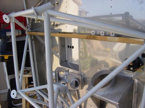 Here you can see the 'spreader bar' used to align the 'other top hole with the firewall pilot hole