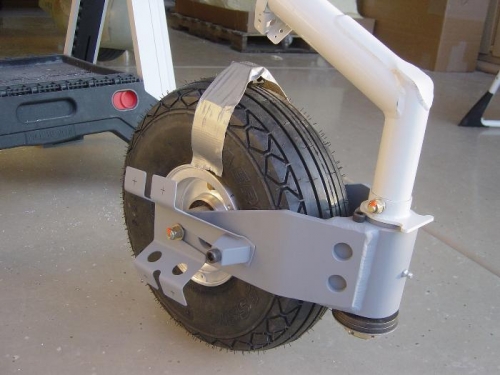 right mounted to nose wheel w/ spacer