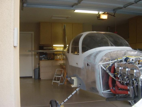 Garage ceaned out, and A/C repositioned to allow room to reattach  empennage