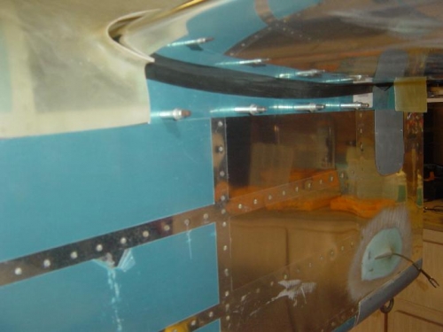 Bottom fairing and rubber gap seal clecoed in place.