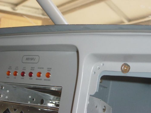 Grey vinyl welt cord superglued to top of glareshield underside