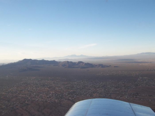 Looking South, town of Picture Rocks with Saguaro National Park West farther out.