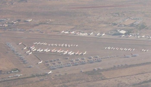 Airliners in storage at Pinal Air Park.  Practice drop zone for fires in the background.