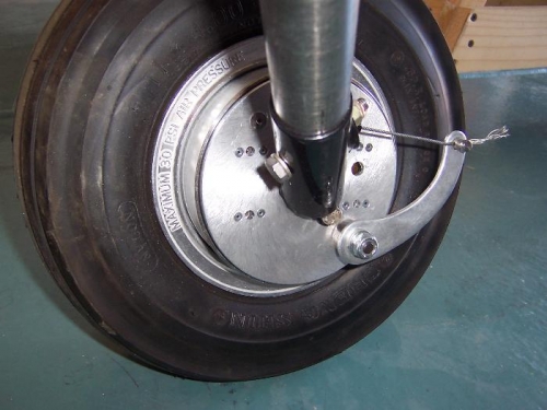 Nutplates on the brake backing plate.