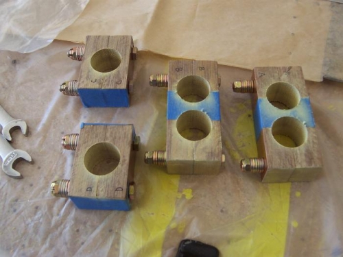 Blue tape held blocks together prior to drilling.  Drilled for bolts first and installed the bolts.