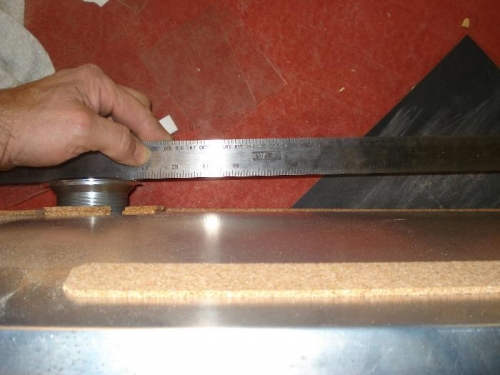 Angle of the flange with reference to the tank top.