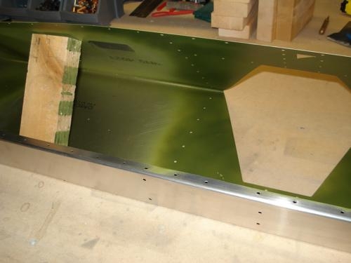 Spot undercoating the elevator interior.