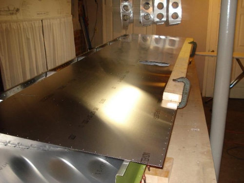 Sandwiching the skin between two 2x4 help keep the noodle managable.