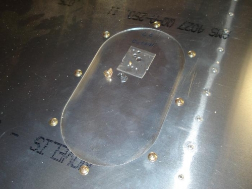 Bell Crank inspection hole cover in place