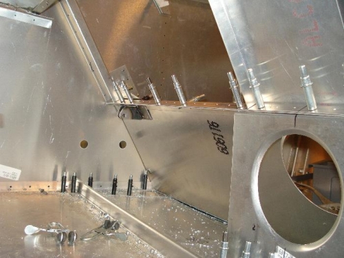 The Flap actuactor mounting plate in place. on the back of the seat.