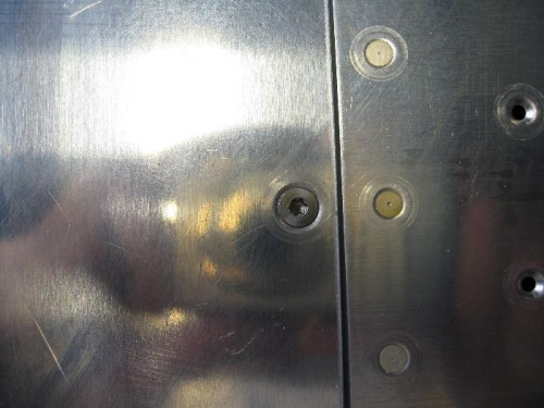 Close up of hatch screw down - note the 6 lobe screws