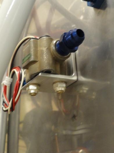 The fuel flow transducer bolted in place