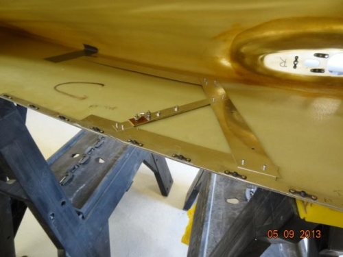 The antenna and nutplates riveted in place