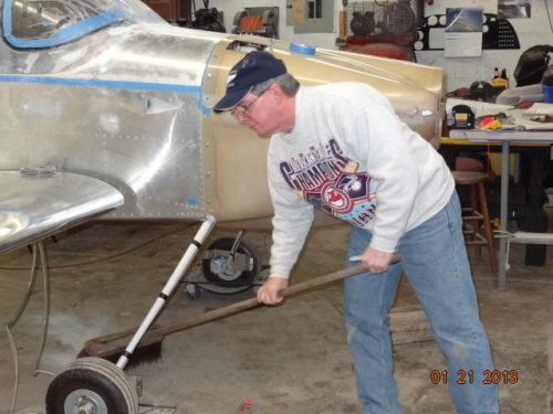 Sweeping the floor, getting ready to mark the fuselage line