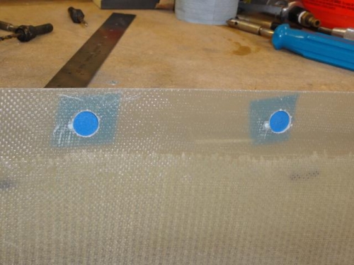The drilled holes by the camloc grommet holes are filled with SuperFil