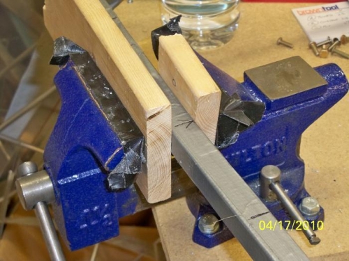 The frame clamped in the vise