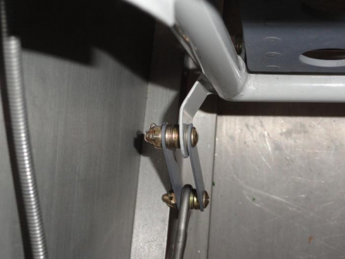 The rudder cable attached to the pedal