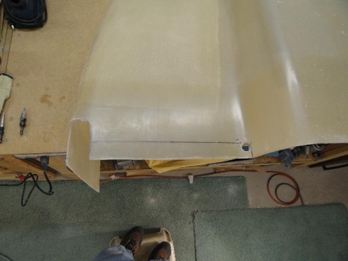 The bottom edge of the cowling marked for the initial trimming