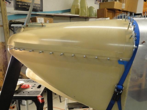The cowlings in place with the top being pushed out