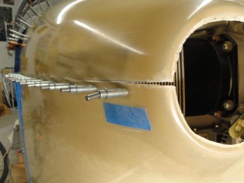 The right side with the bowed out top cowling