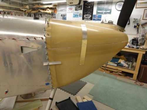 The right side of the cowlings taped together