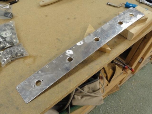 The right side brace after the holes have been drilled for the camlocs