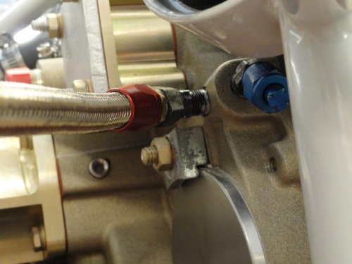 The oil pressure line and fitting