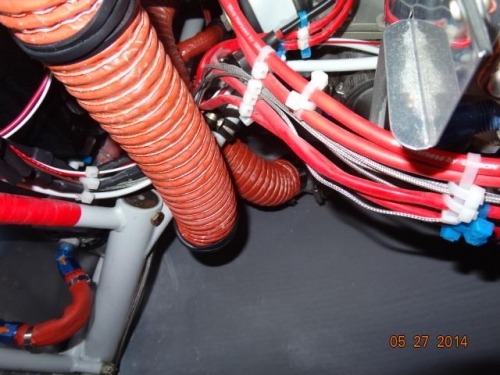 The Scat tubing tied to the engine mount