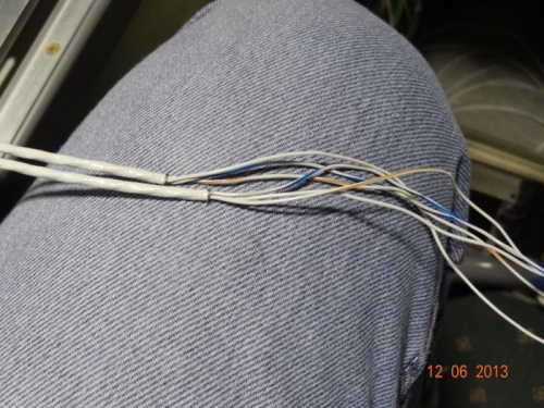 The two sets of landing light wires from the left wing