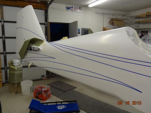 The aft right side of the fuselage after striping