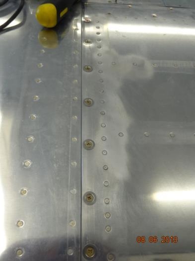 The fuel tank with washers and screws