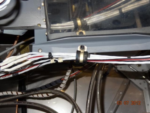 The right side set of wires clamped under the map box