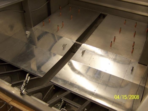 Seat Floors and Baggage Skins in Place