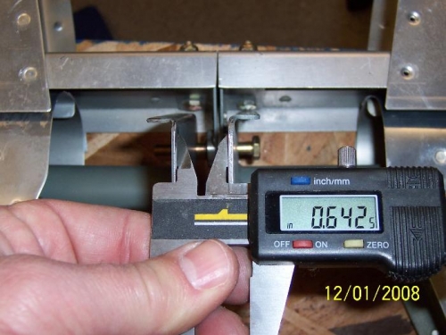 Micrometer showing gap between elevator horns