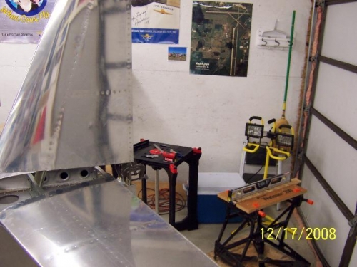 VS on fuselage and laser set up to mark the bolt holes